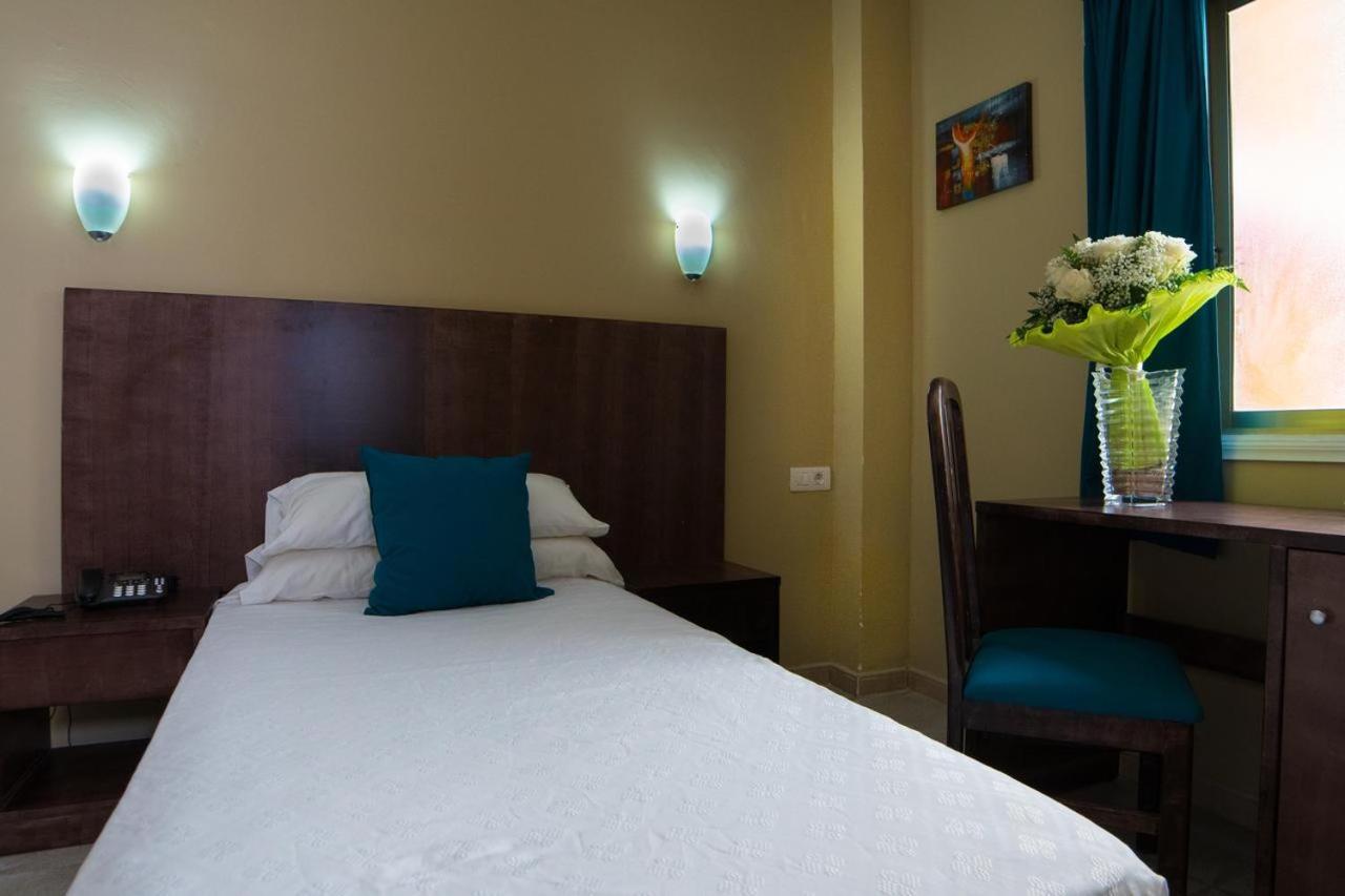 Hotel Aeropuerto Sur Сан-Исидро Экстерьер фото